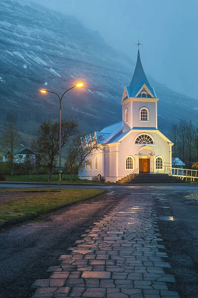 Seydisfjordur, eastern fjords, Iceland. Church at dusk