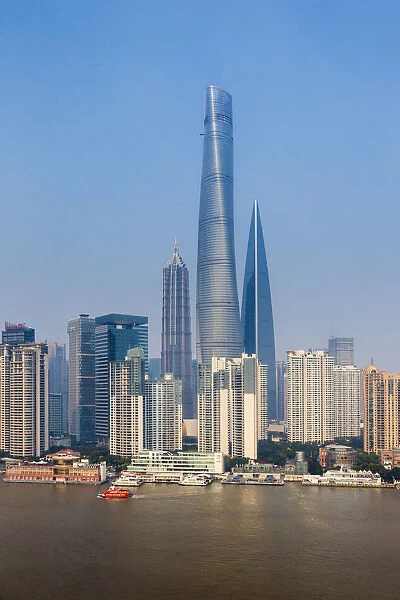 Shanghai Tower and the Pudong skyline across the Huangpu river, Shanghai, China