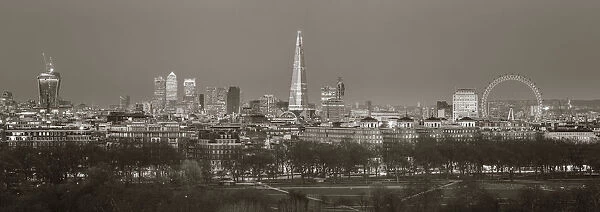 The Shard, Canary Wharf and London Eye above Hyde Park, London, England, UK