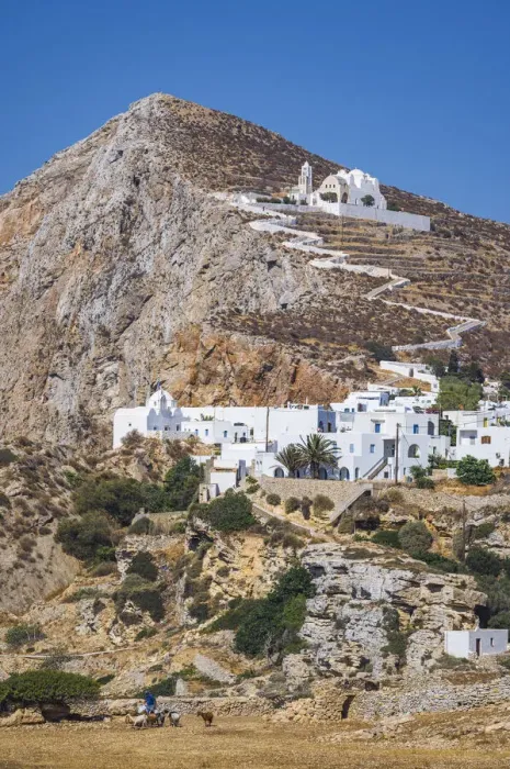 Framed Print : shepherd with goats and the Hora Village in Folegandros, Cyclades Islands, Greece Framed Print : shepherd with goats and the Hora Village in Folegandros, Cyclades Islands, Greece