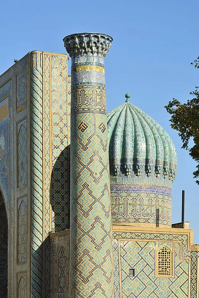 Sher-Dor Madrasah and minaret at the Registan square. A Unesco World Heritage Site