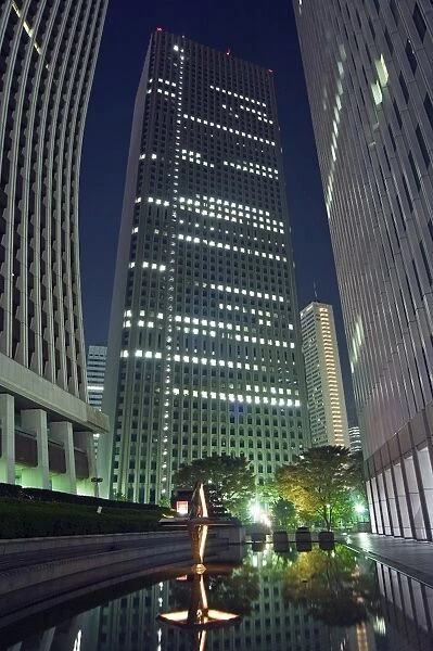 Shinjuku skyscrapers and city buildings at night