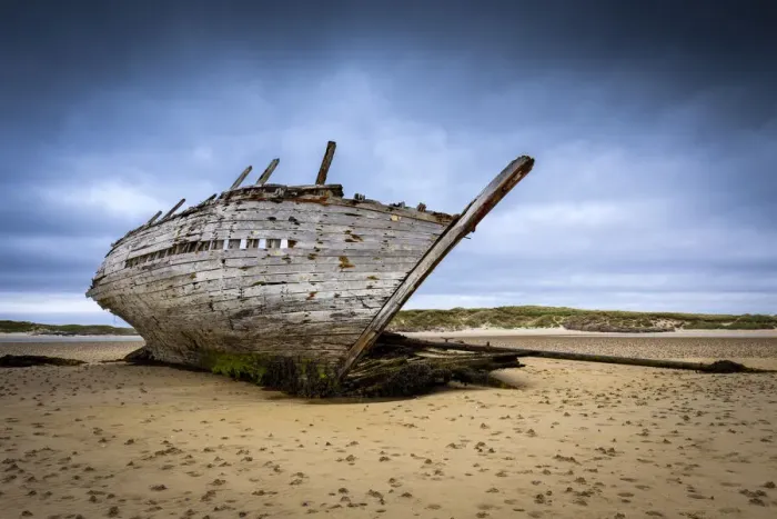 Framed Print : Shipwreck at low tide on Magheraclogher beach. An Bun Beag, Bunbeg, County Donegal Framed Print : Shipwreck at low tide on Magheraclogher beach. An Bun Beag, Bunbeg, County Donegal