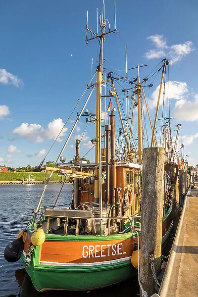 Shrimp boats in the harbor of Greetsiel, East Frisia, Lower Saxony, Germany