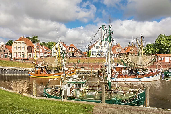 Shrimp boats in the harbor of Greetsiel, East Frisia, Lower Saxony, Germany