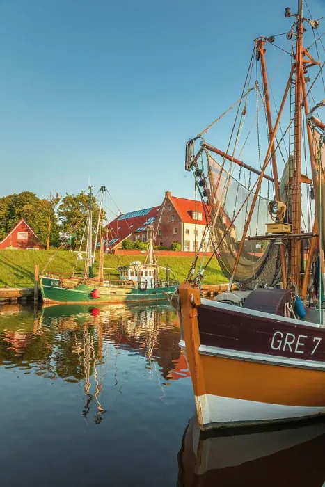 Framed Print : Shrimp boats in the harbor of Greetsiel at sunset, East Frisia, Lower Saxony, Germany Framed Print : Shrimp boats in the harbor of Greetsiel at sunset, East Frisia, Lower Saxony, Germany