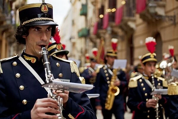 Sicily, Italy, Western Europe; A clarinettist, of the band members, during the Misteri procession