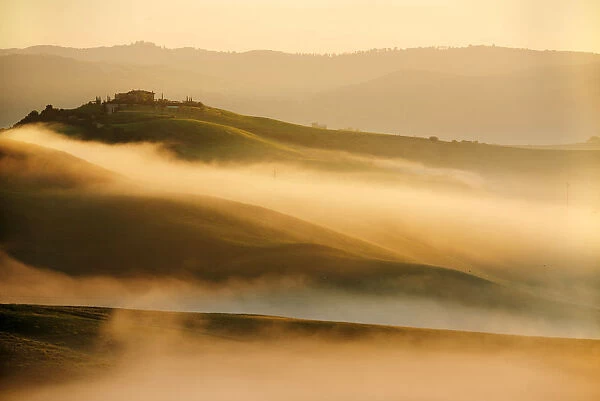 Siena countryside (Crete Senesi) at sunrise in early spring, Tuscany, Italy