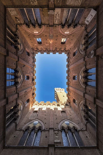 Siena, Tuscany, Italy, Europe. Classic bottom view of Palazzo Pubblico with Del