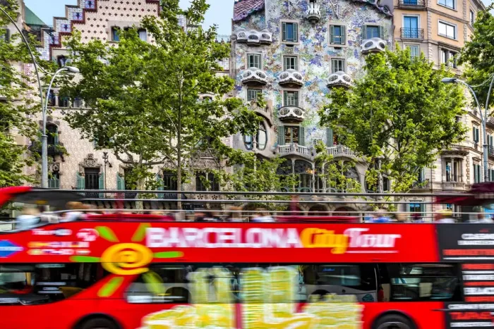 Framed Print : Sightseeing bus in front of Casa Batllo, Barcelona, Catalonia, Spain Framed Print : Sightseeing bus in front of Casa Batllo, Barcelona, Catalonia, Spain