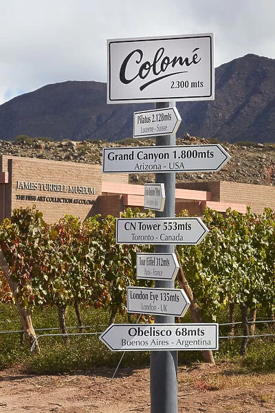 Signs indicating elevation differences in meters inside the Bodega Colomewinery