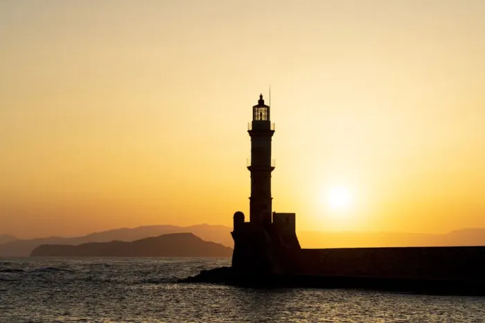 Framed Print : Silhouette of Chania old lighthouse at sunset, Crete island, Greece Framed Print : Silhouette of Chania old lighthouse at sunset, Crete island, Greece