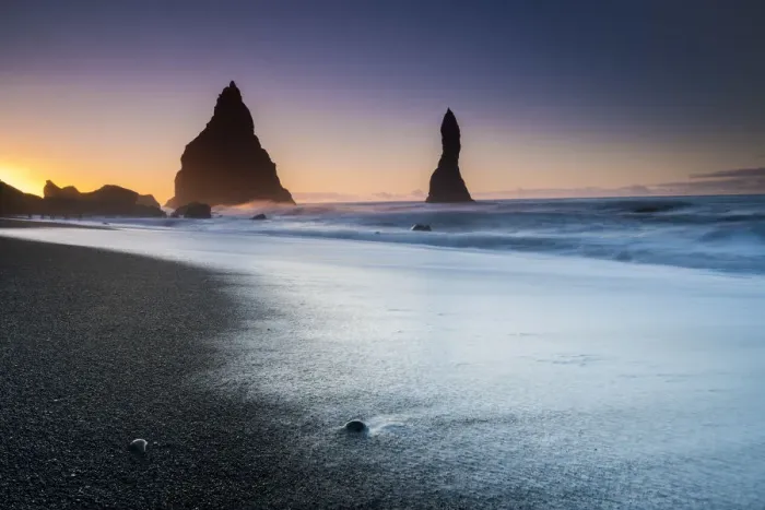 Framed Print : Silhouette Reynisdrangar rock formations in sea near Vik i Mydral during sunrise Framed Print : Silhouette Reynisdrangar rock formations in sea near Vik i Mydral during sunrise