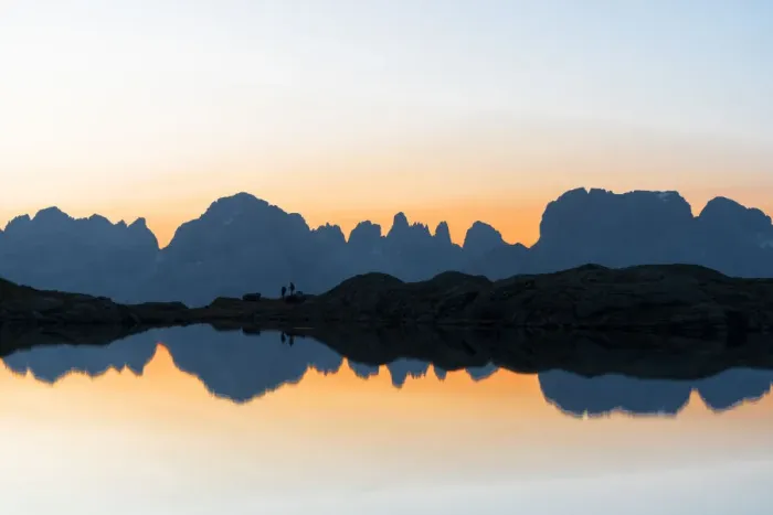 Framed Print : Silhouettes of hikers admiring Brenta Dolomites at dawn from Lago Nero di Cornisello Framed Print : Silhouettes of hikers admiring Brenta Dolomites at dawn from Lago Nero di Cornisello