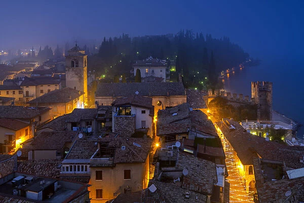 Sirmione seen from the Scaligero castle at the blue hour, Brescia province, Lombardy