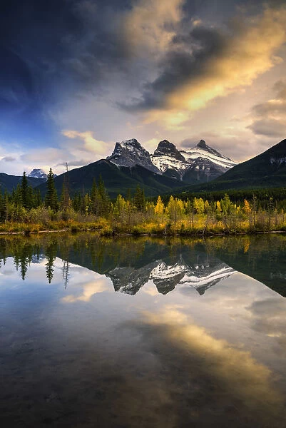 Three Sisters Reflecting in Bow River, Banff National Park, Alberta, Canada