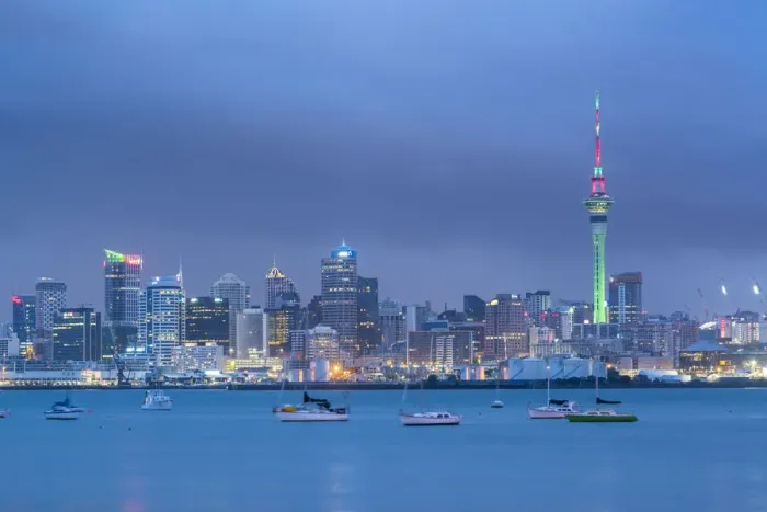 Framed Print : Skyline of Auckland Central Business District under a gloomy sky at dusk. Auckland City, Auckland region Framed Print : Skyline of Auckland Central Business District under a gloomy sky at dusk. Auckland City, Auckland region