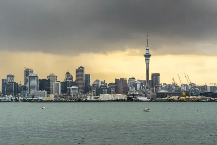 Framed Print : Skyline of Auckland Central Business District under a gloomy sky at sunrise. Auckland City, Auckland region Framed Print : Skyline of Auckland Central Business District under a gloomy sky at sunrise. Auckland City, Auckland region