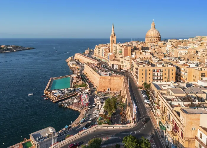Framed Print : Skyline with Basilica of our Lady of Mount Carmel Dome and St.Pauls Anglican Cathedral Spire, Sunset Valletta, Malta Framed Print : Skyline with Basilica of our Lady of Mount Carmel Dome and St.Pauls Anglican Cathedral Spire, Sunset Valletta, Malta