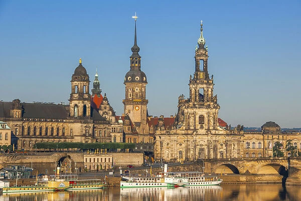 Skyline of Dresden with Bruehl's Terrace, Hofkirche, Residential palace and paddle steamer on river Elbe, Dresden, Saxony, Germany