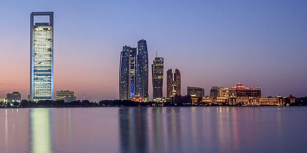 Skyline with Etihad Towers at dawn, Abu Dhabi, United Arab Emirates