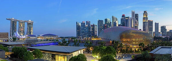 Skyscrapers of Central Business District, Marina Bay Sands Hotel and Theatres on the Bay at dusk, Singapore