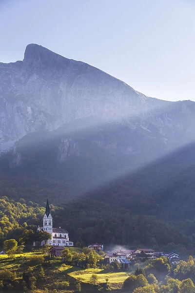 Slovenia, Goriska Region, Dreznica. The Church of the Sacred Heart, backdropped by