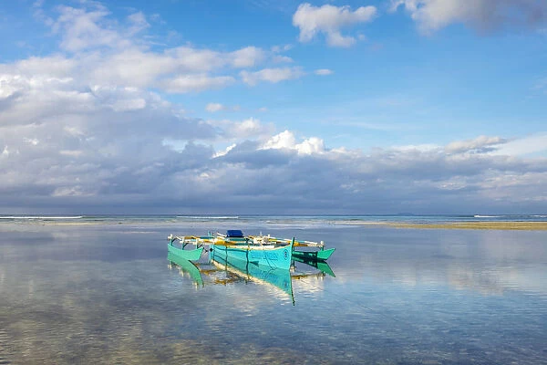 Small boat anchored at low tide, Lala-o, San Juan beach, Siquijor Island, Central Visayas