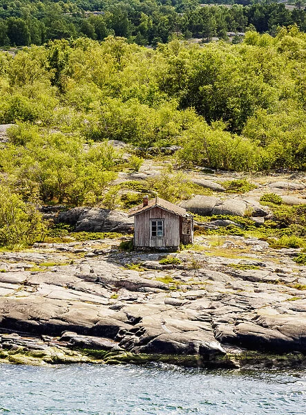 Small cabin on the coast, elevated view, Aland Islands, Finland