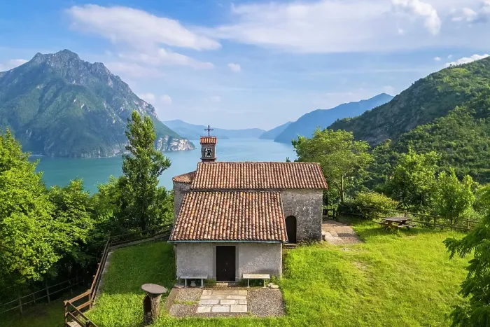 Framed Print : small church of San Lorenzo dominating Lake Iseo in summer. Castro, Iseo Lake, Bergamo district, Lombardy, Italy Framed Print : small church of San Lorenzo dominating Lake Iseo in summer. Castro, Iseo Lake, Bergamo district, Lombardy, Italy