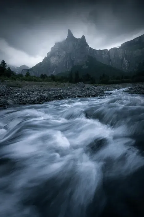 Framed Print : A small stream comes down from the mountains in the valley of Sixt-fer-a-Cheval, Haute Savoie, France during a gloomy summer evening Framed Print : A small stream comes down from the mountains in the valley of Sixt-fer-a-Cheval, Haute Savoie, France during a gloomy summer evening