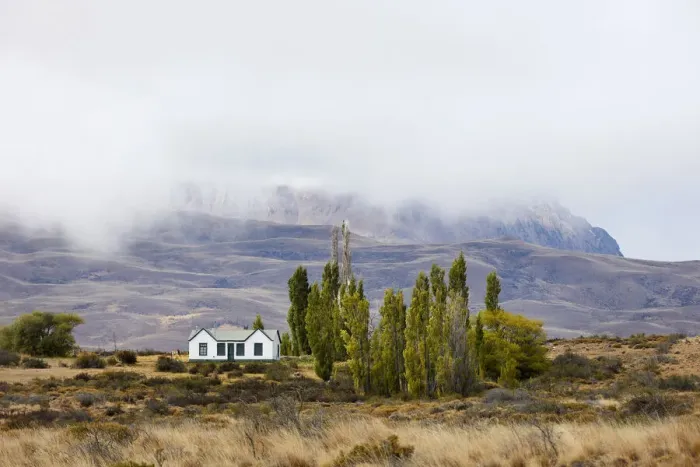 Framed Print : A small traditional house surrounded by the Patagonian landscape Framed Print : A small traditional house surrounded by the Patagonian landscape