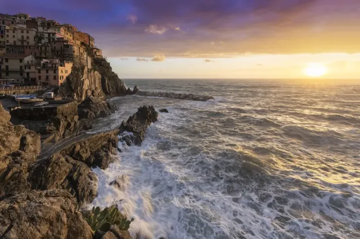 Framed Print : The small village of Manarola at sunset after a storm. Cinque Terre, La Spezia district