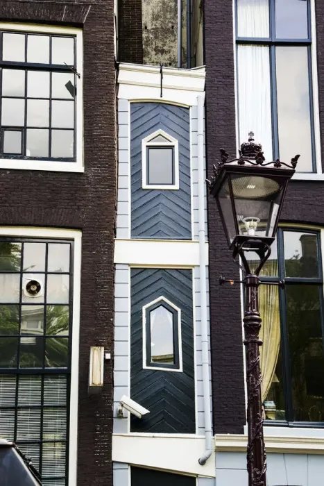 Framed Print : The smallest house in Amsterdam, the Netherlands Framed Print : The smallest house in Amsterdam, the Netherlands
