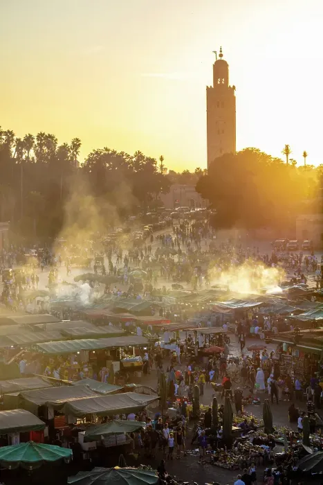 Framed Print : Smoke rising from food stalls at sunset, Koutoubia Minaret in the background, Djemaa el Fna, Marrakech, Morocco Framed Print : Smoke rising from food stalls at sunset, Koutoubia Minaret in the background, Djemaa el Fna, Marrakech, Morocco