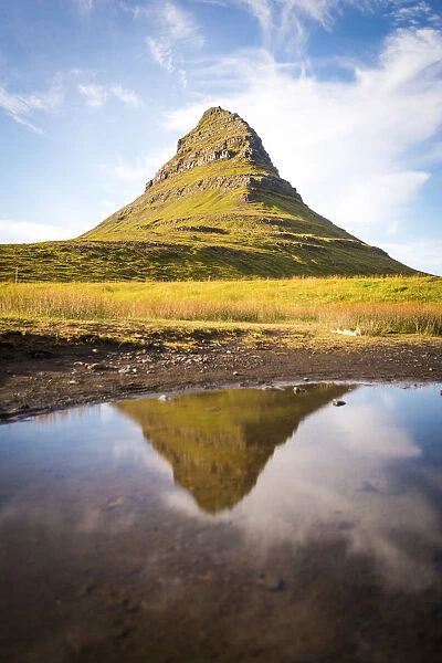 Snaefellsnes peninsula, Iceland. Kirkjufell Mountain reflecting on water