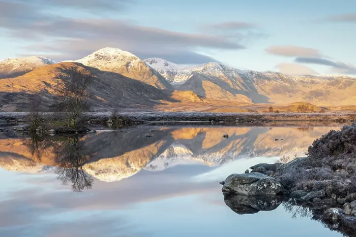 Framed Print : Snow capped mountain reflections in Lochan na h-Achlaise on a frosty winter morning in Rannoch Moor, Scottish Highlands, Scotland, UK. March 2024 Framed Print : Snow capped mountain reflections in Lochan na h-Achlaise on a frosty winter morning in Rannoch Moor, Scottish Highlands, Scotland, UK. March 2024