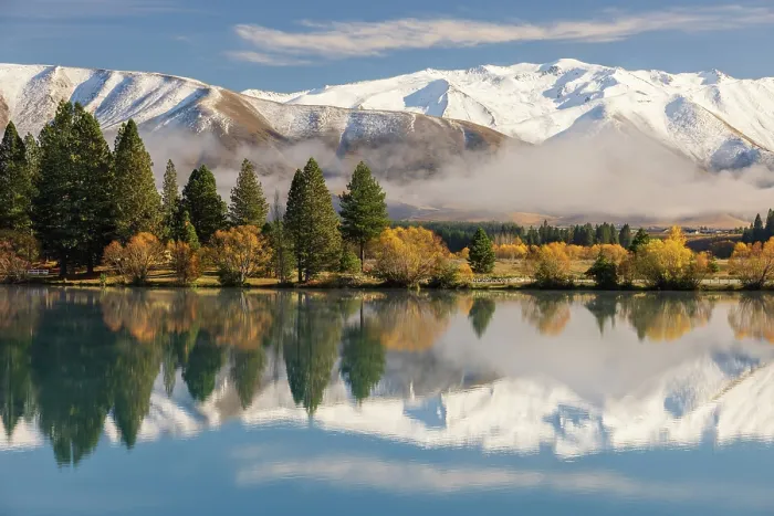 Framed Print : Snow capped mountains and autumnal colours at Lake Ruataniwha near Twizel, Canterbury, South Island, New Zealand. Autumn (May) 2025