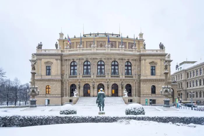 Framed Print : Snow-covered Antonin Dvorak statue in front of Rudolfinum concert hall in winter