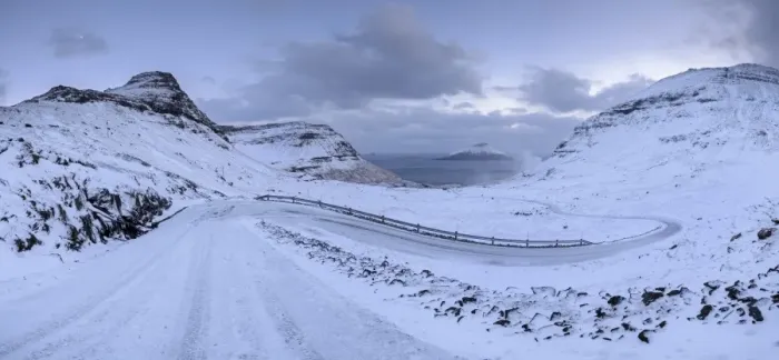 Framed Print : Snow covered mountain road on the Island of Streymoy, Faroe Islands, Denmark, Europe