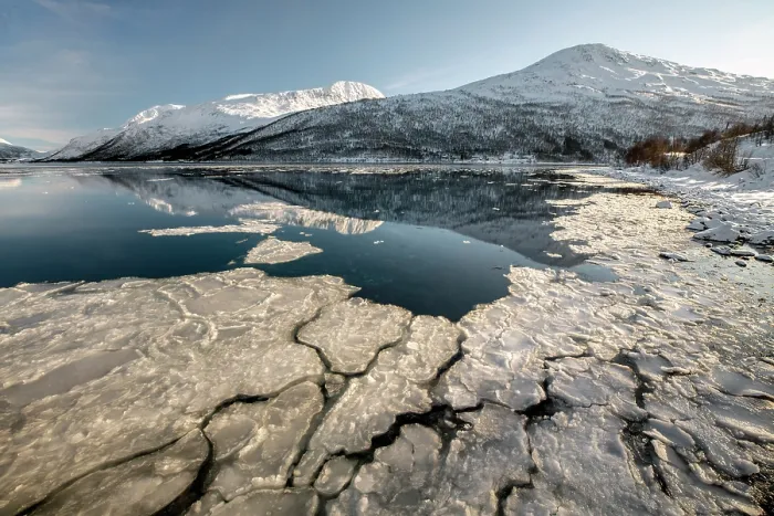 Framed Print : Snow-covered mountains and floating ice, island of Kvaloya, near Tromso, Norway Framed Print : Snow-covered mountains and floating ice, island of Kvaloya, near Tromso, Norway