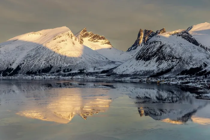 Framed Print : Snow-covered mountains reflecting in Bergsfjord from theBergsbotn viewpoint, Senja, Troms county, Norway Framed Print : Snow-covered mountains reflecting in Bergsfjord from theBergsbotn viewpoint, Senja, Troms county, Norway