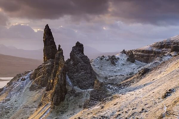Snow dusted Old Man of Storr at sunrise, Isle of Skye, Scotland. Winter (December) 2013