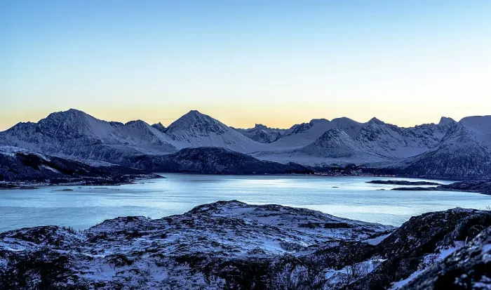 Framed Print : Snowcapped mountains and frozen sea at dusk, Sommaroy, Troms county, Norway Framed Print : Snowcapped mountains and frozen sea at dusk, Sommaroy, Troms county, Norway