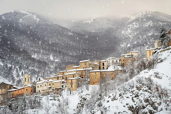 Snowfall on the old village of Villalago, Abruzzo national park, L'aquila province, Abruzzo, Italy