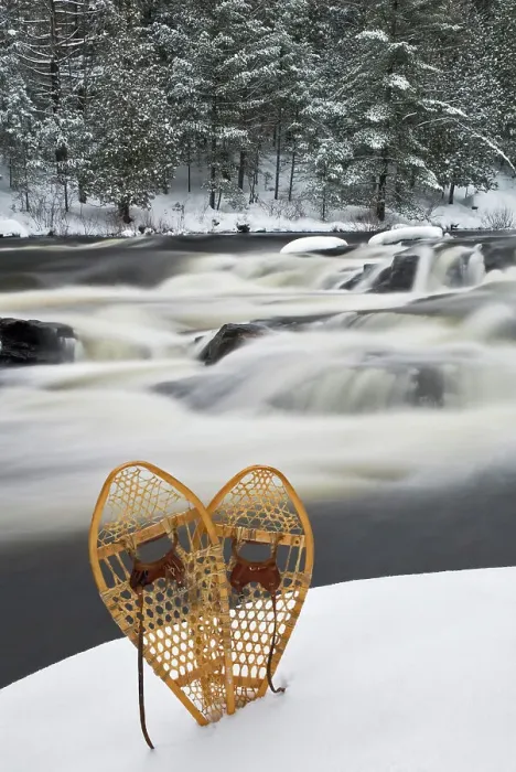 Framed Print : Snowshoes beside the Muskoka River, Bracebridge, Ontario, Canada