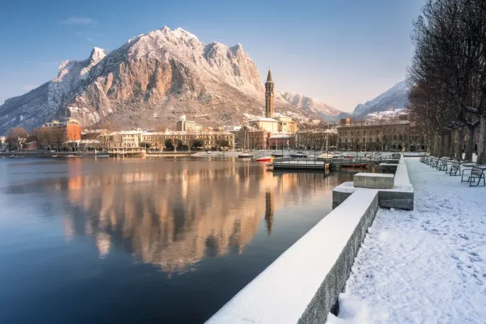 Framed Print : Snowy lakefront of Lecco and San Martino Mountain reflected in Como lake, Lecco province Framed Print : Snowy lakefront of Lecco and San Martino Mountain reflected in Como lake, Lecco province