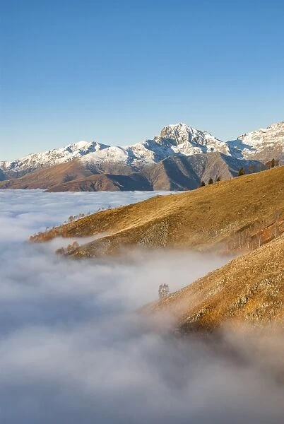 Snowy mountains over the clouds (Bielmonte, Veglio, Biella province, Piedmont, Italy