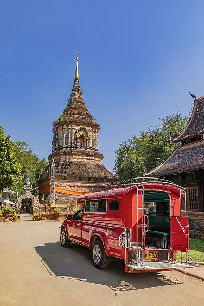 Songthaew (Chiang Mai taxi) parked at Wat Lok Moli, Chiang Mai, Northern Thailand