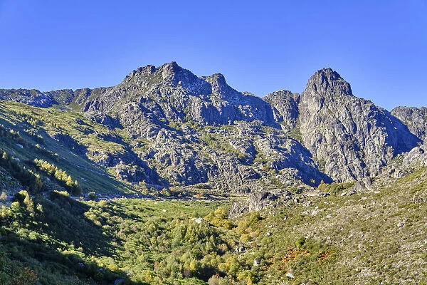 The source of the Zezere river. Covao da Ametade and the three peaks from where flows
